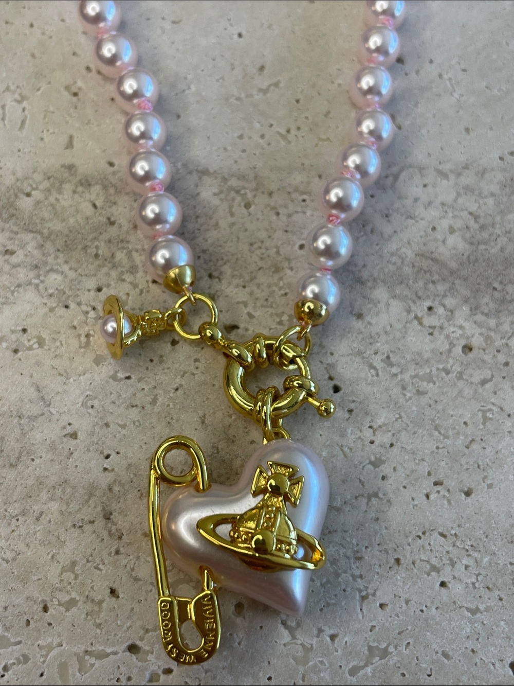 Vivienne Westwood Pink Pearl Necklace with Gold Orb Heart and Safety Pin Charms